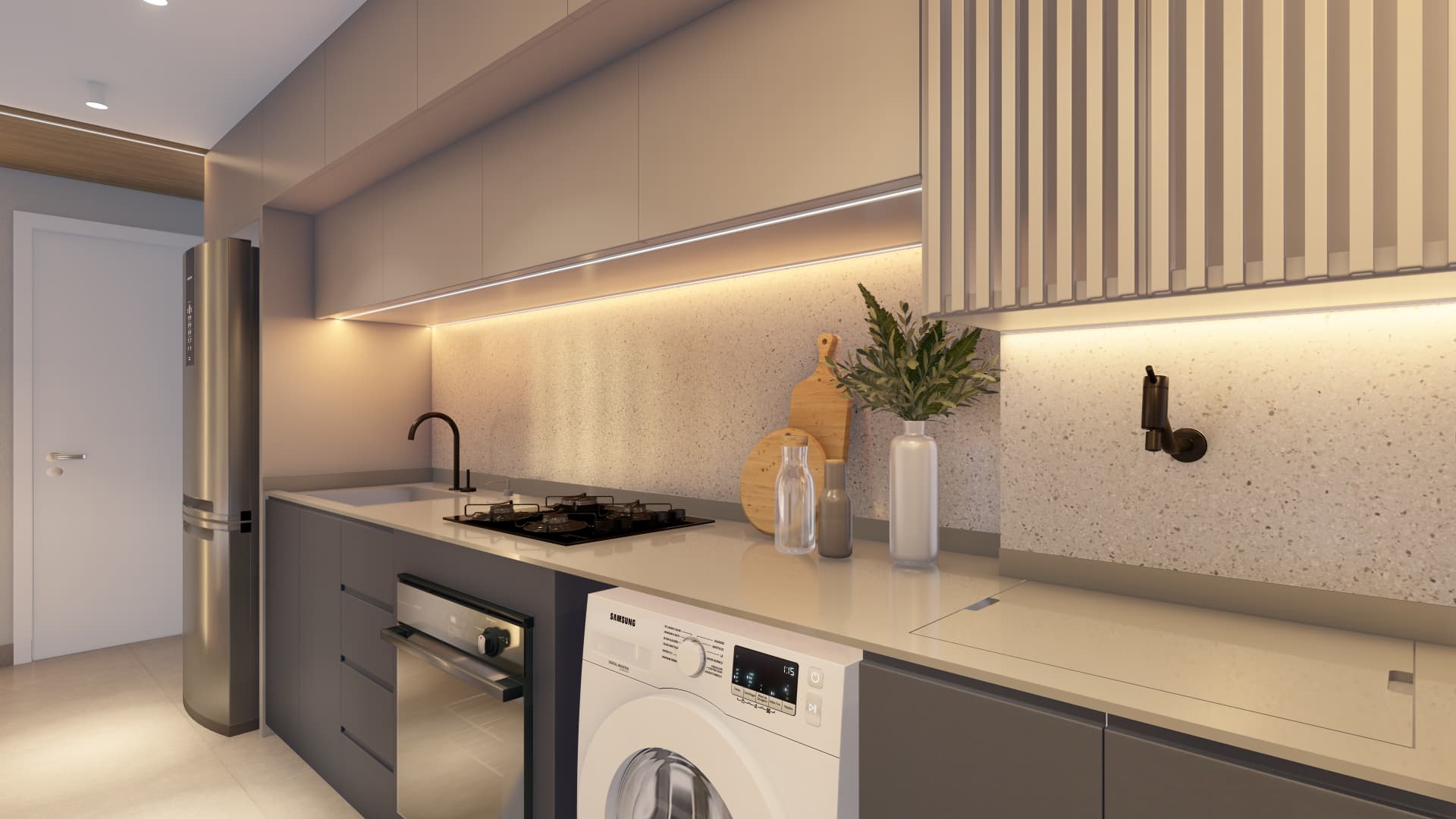 Cozinha planejada com marcenaria em grafite, bancada clara e iluminação embutida