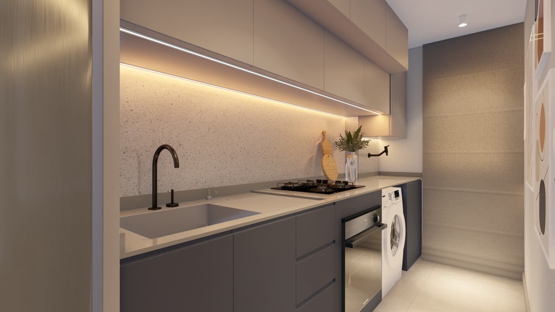 Cozinha planejada com marcenaria escura, bancada clara e iluminação embutida